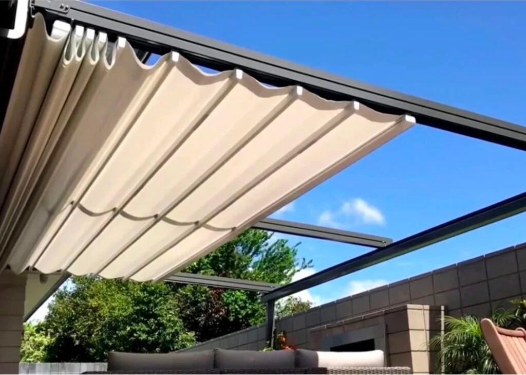 Motorised retractable pergola shown from the side with the roof extended